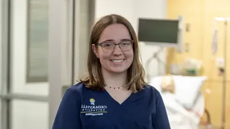 Female nursing student in the simulation lab.